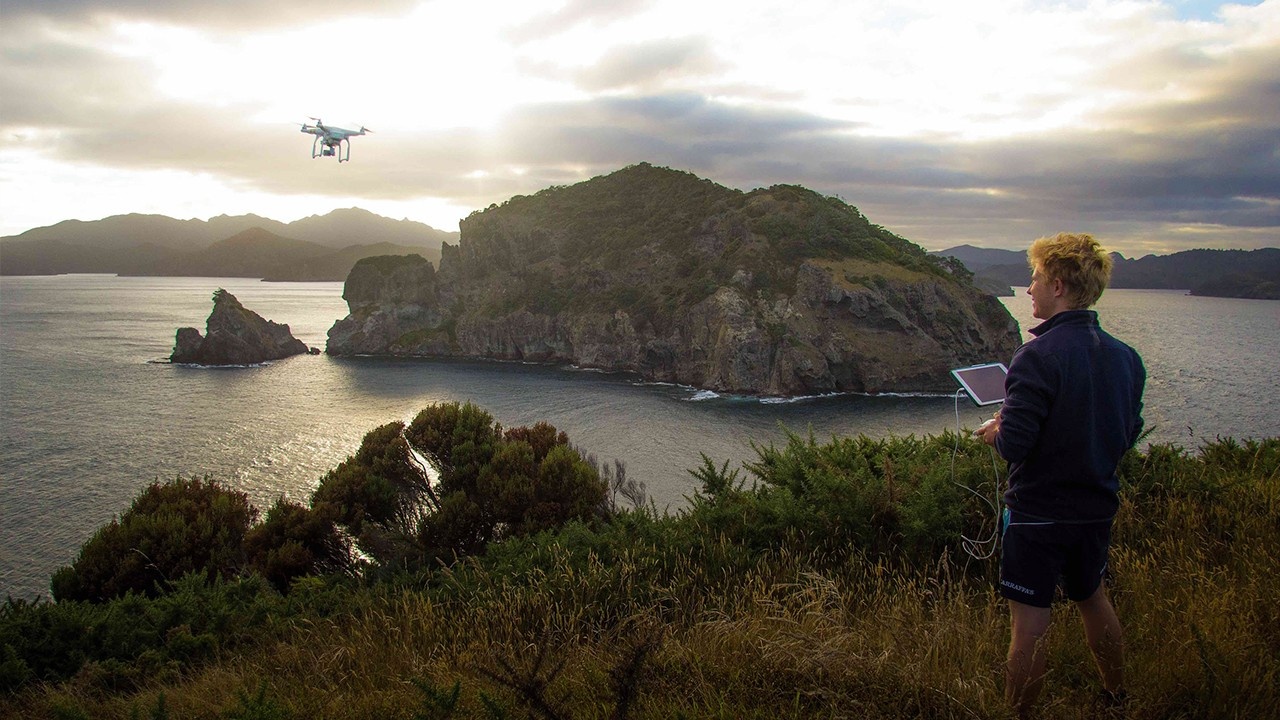 Sebastian filming with drone